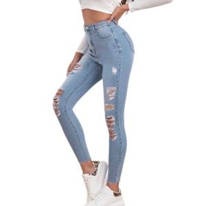 High Waisted Ripped Raw Hem Light Wash Skinny Jeans